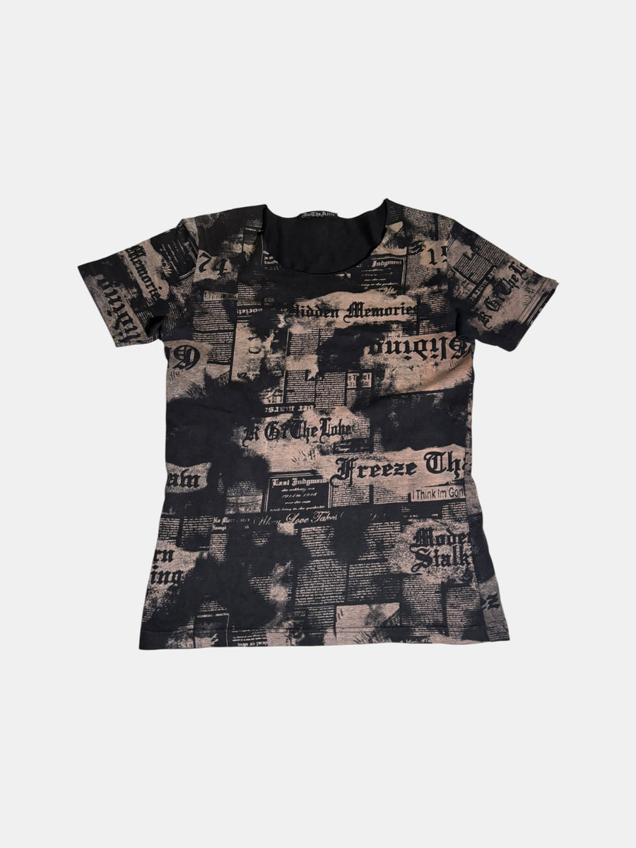 in the attic Newspaper Print T-Shirt