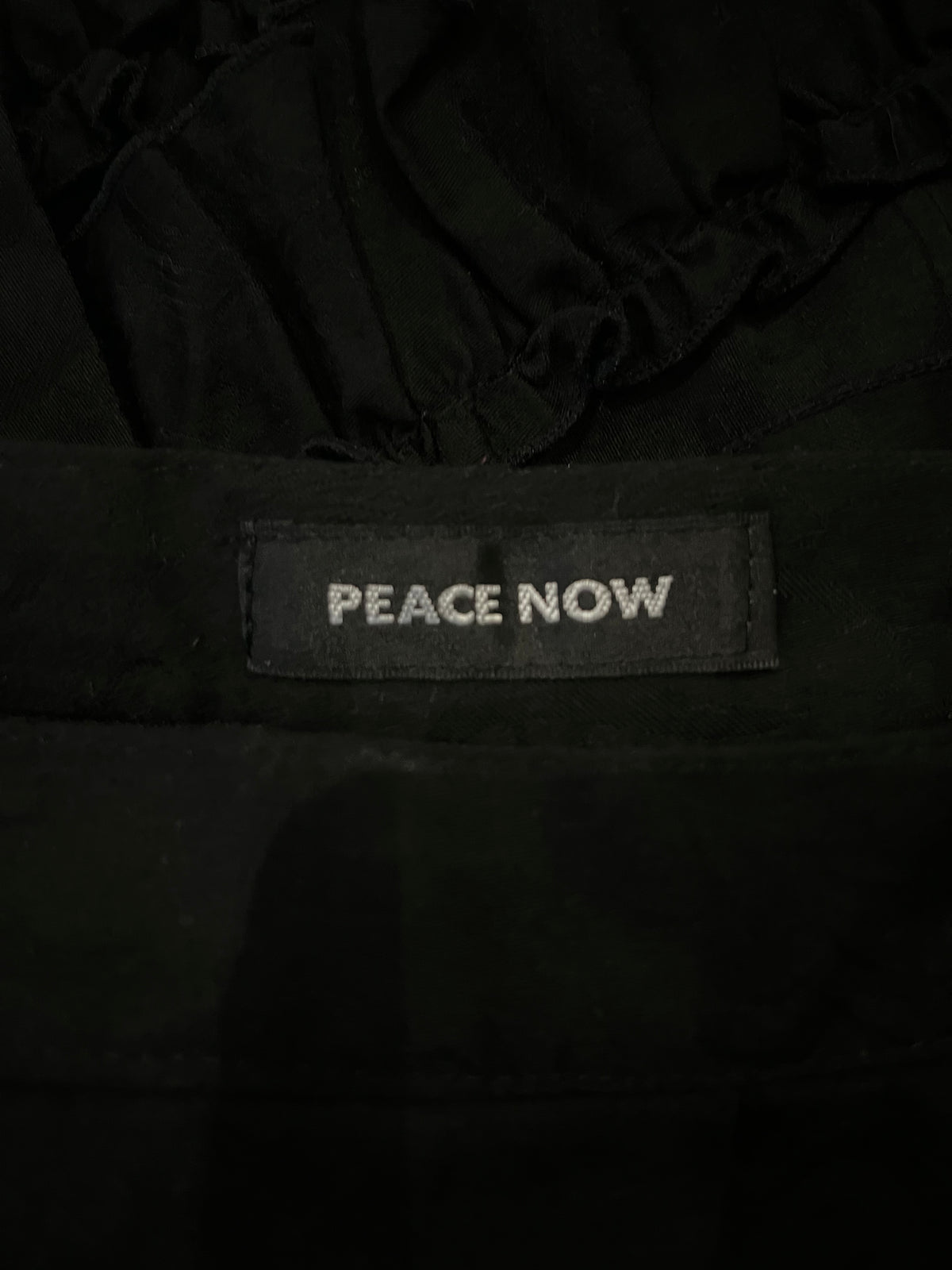PEACE NOW Asymmetric Ruffle Skirt